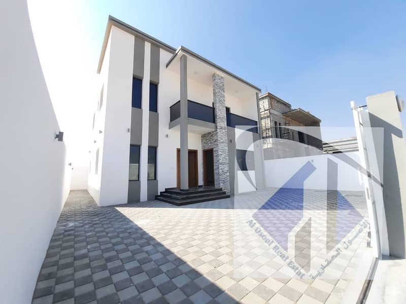 Villa for sale, high quality finishes, Al Zahia area, on a street