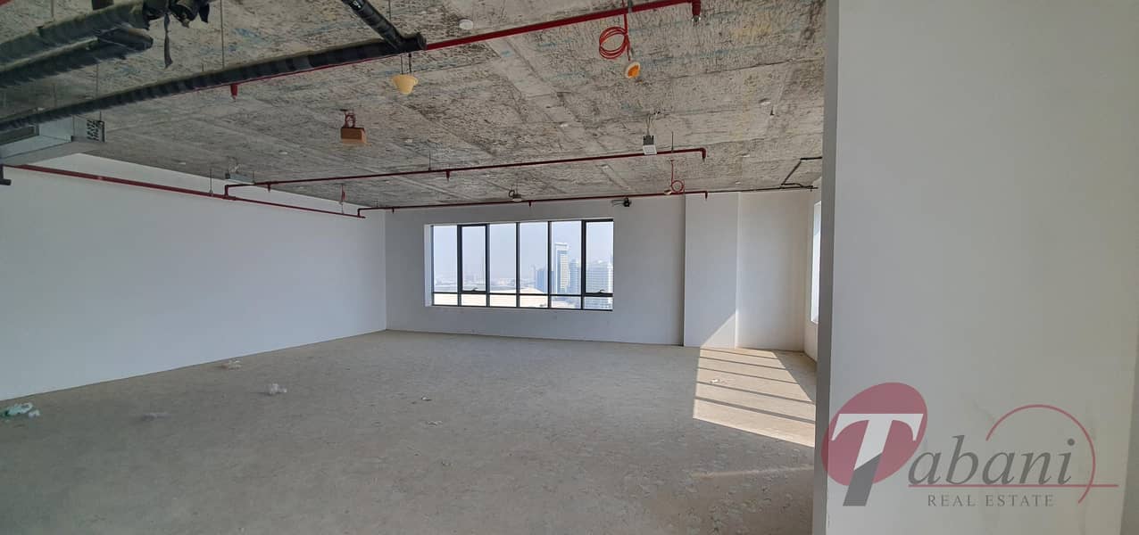 Shell and Core office for sale on higher floor.