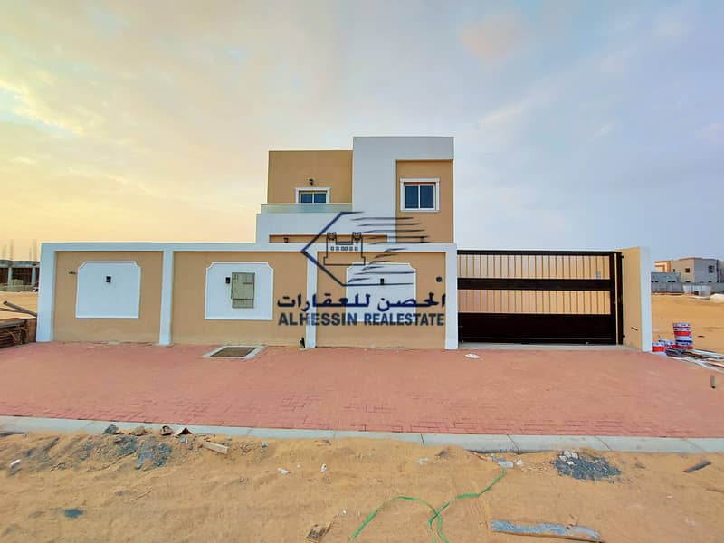 Villa for sale in Ajman, Al Zahia area, two floors, on a direct street, with the possibility of bank financing