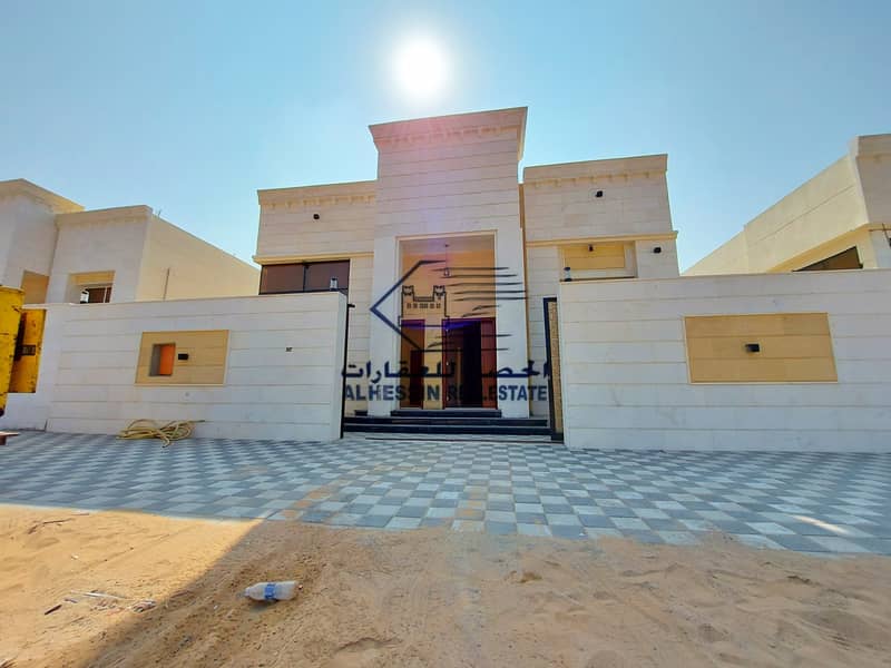Villa for sale in Ajman, Al Amerah area, ground floor, facing stone, excellent location with the possibility of bank financing