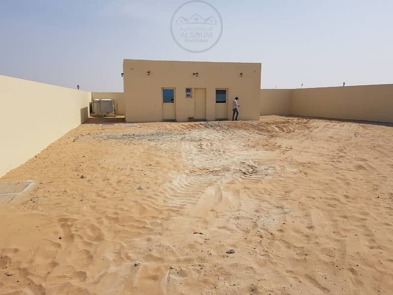 LAND WITH TWO ROOMS AND BOUNDARY WALLS FOR RENT