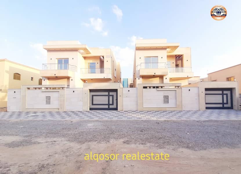 Villa for sale in Ajman, Al Mowaihat area, modern design with excellent stone face, finishes with the possibility of bank financing