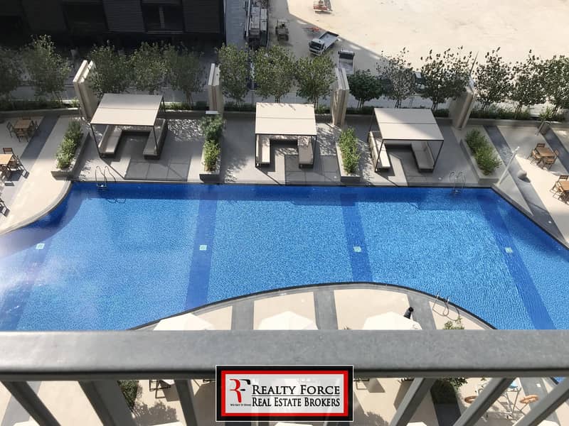 POOL VIEW | 2BR + MAIDS | BRAND NEW | VACANT