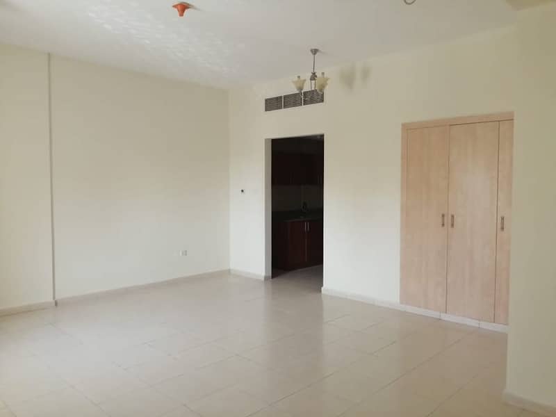 Int. City | Emirates Cluster | Exclusive Offer | Bright And Clean Large Studio | Very near to bus Stop| For Rent |Ready to move-in