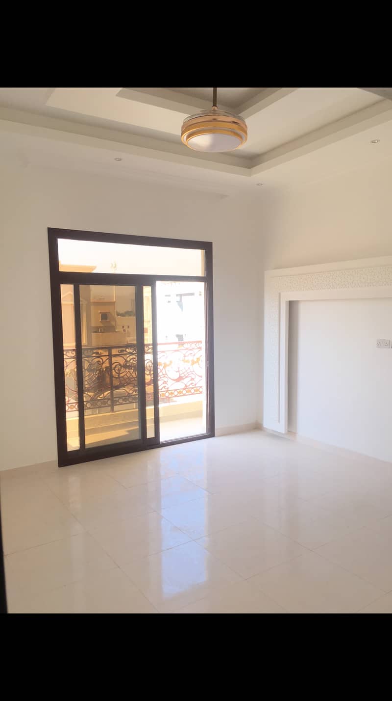 Villa for sale, personal finishing, excellent price, Ajman, close to the main street, a large building area