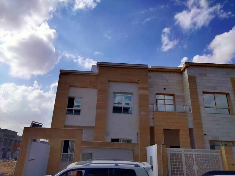 Villa for sale in Al Ittihad Village, in the Jasmine area, Ajman, at a price of a cat, and the villa is stone finished.