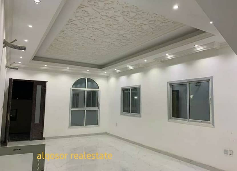 Villa for sale in Ajman, Al Mowaihat area, two floors, with a different design at the corner of two streets, with the possibility of bank financing