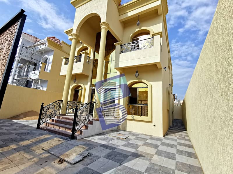 Villa for sale in Ajman, Al Mowaihat area, two floors, with a different design next to all services, with the possibility of bank financing