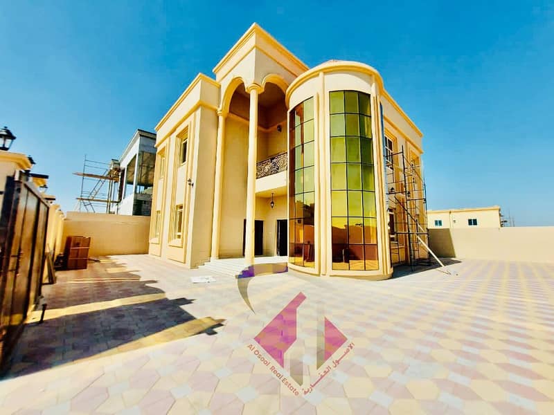 For sale, a villa in Ajman, different style, finishing, magnificence, free ownership for all nationalities, with a large bank leniency