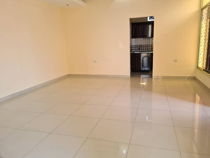 Very good studio for rent in Khalifa City -Notarization of the contract of the municipality