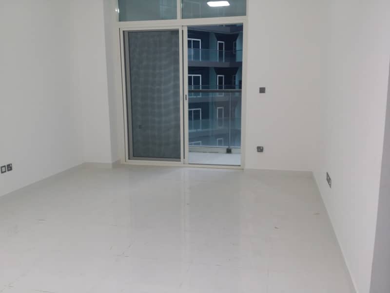 chiller free brand new building  2 bed room for rent in Dubai silicon oasis (Arabian gate ) just in