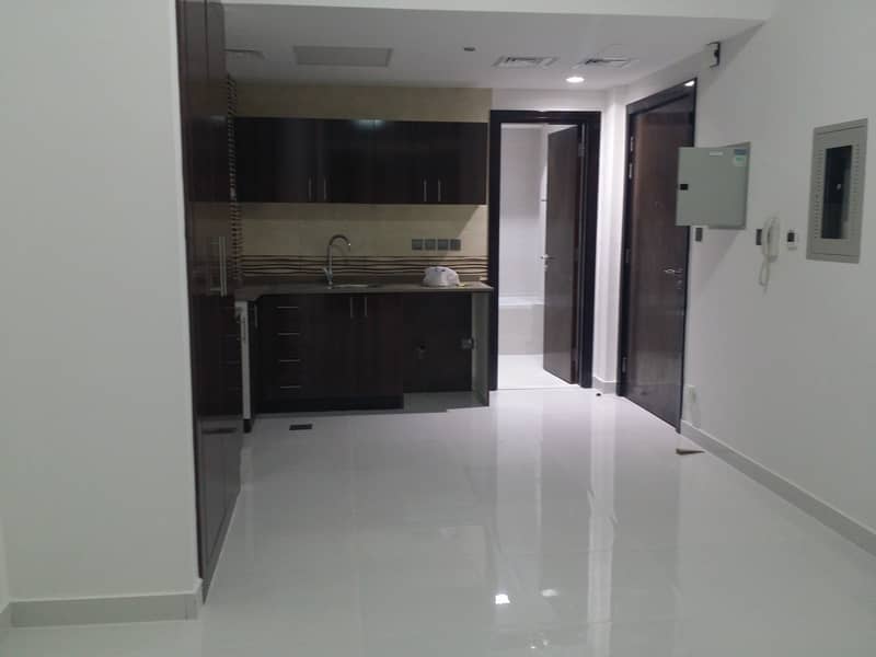 chiller free brand new building studio with balcony for rent in Dubai silicon oasis (Arabian gate  ) just in