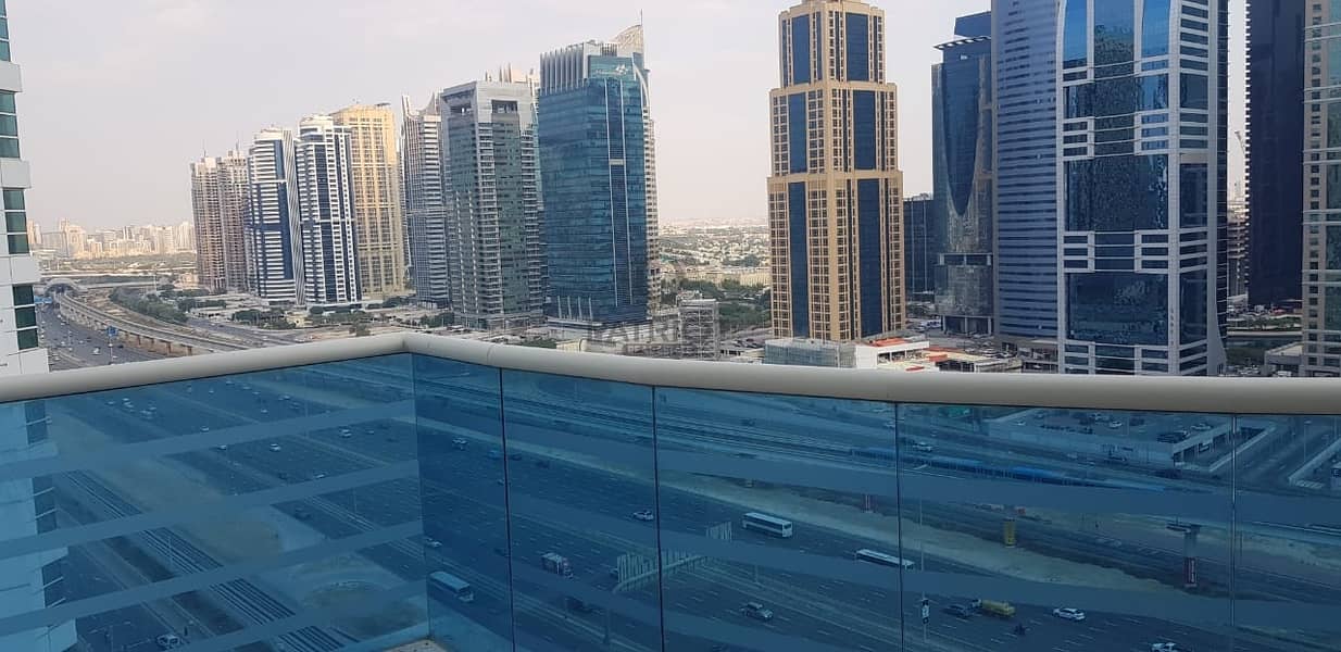 Spacious 1 bedroom apartment with a large terrace and amazing views of sheikh Zayed road.