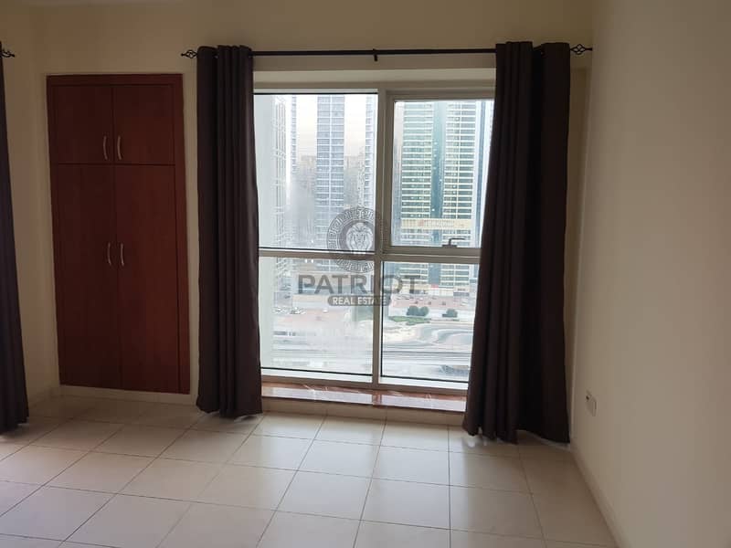 14 Spacious 1 bedroom apartment with a large terrace and amazing views of sheikh Zayed road.