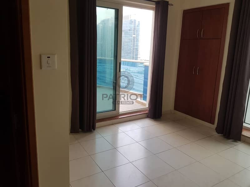 30 Spacious 1 bedroom apartment with a large terrace and amazing views of sheikh Zayed road.