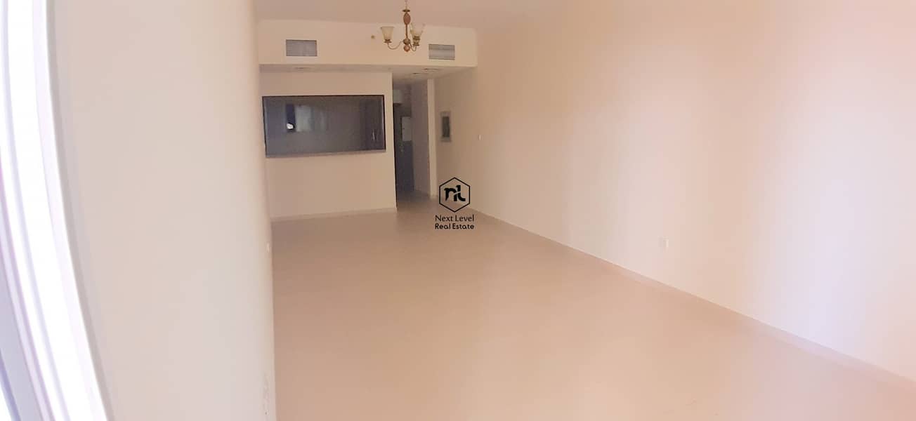 LARGE 1 BED ROOM WITH BALCONY+2 WASH ROOM+STORE+PARKING IN QUEUE POINT DUBAI LAND