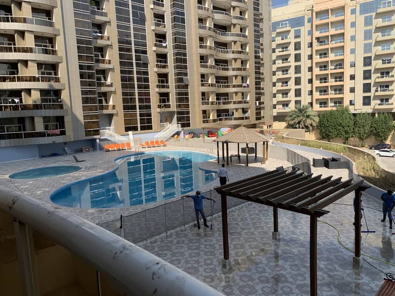 For sale a fully furnished apartment in Silicon Oasis,