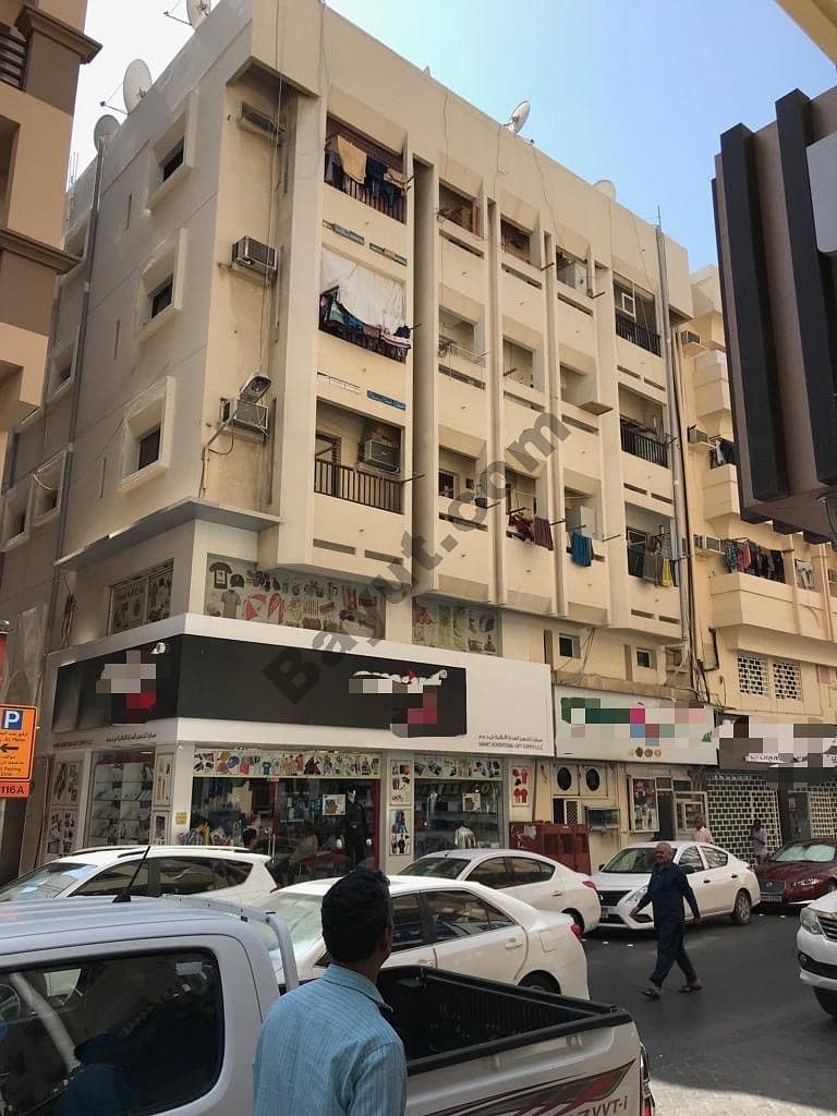 building for sale in naif excellent location price 12 million