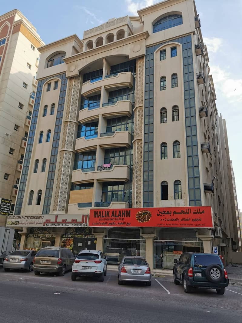 For sale a building in Al-Nughaimia, ground and 5, excellent location, excellent income, fully rented, age 12 years, sale rate, 10 in the water, to communicate via phone or WhatsApp