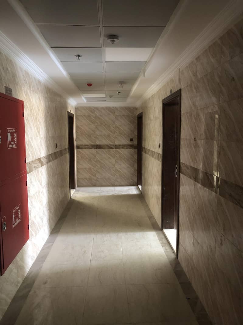 11 i have 1 bedroom hall  new building 1 month fre e in al zahra ajman