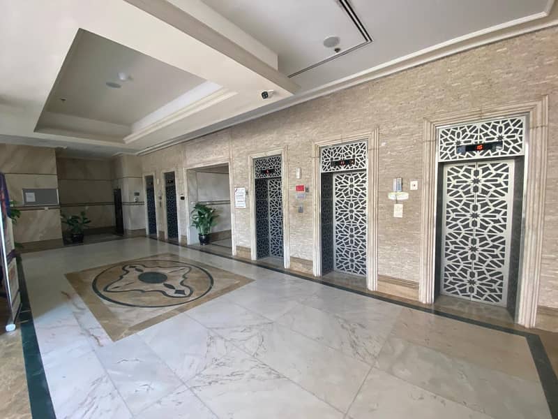 For rent two rooms and a master hall in the Expo Tower on Al Ittihad Street + free car parking