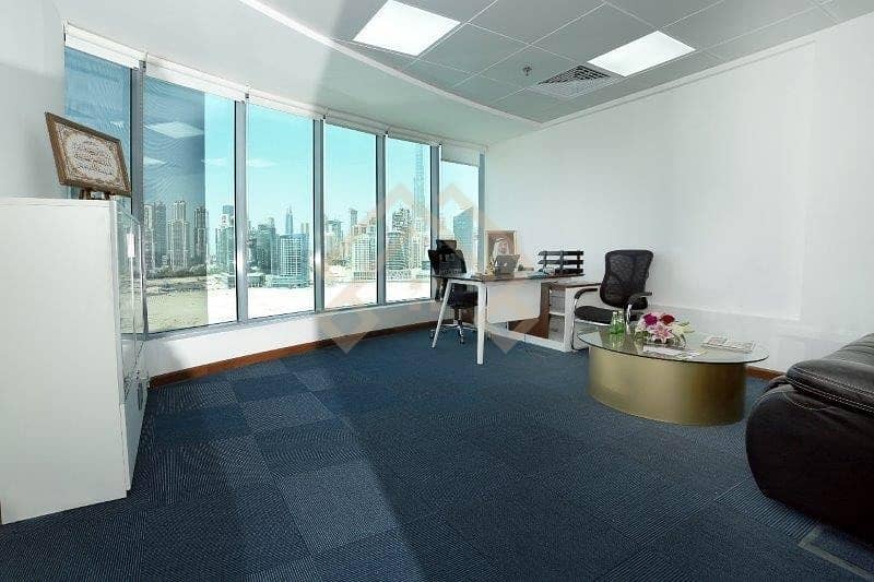 4 Office in DAMAC XL Tower Canal View For Rent. .