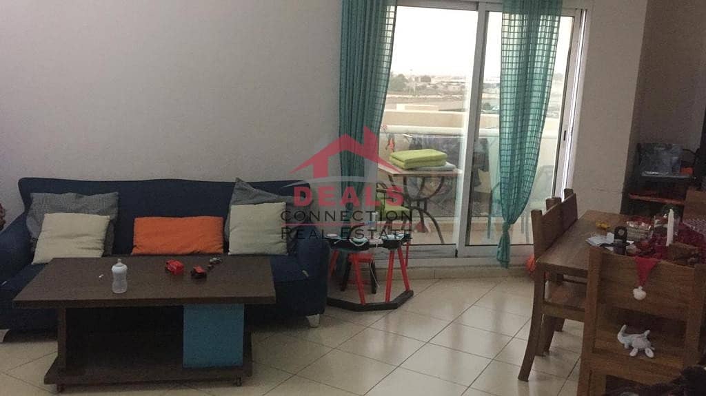 Freehold 1BR Balcony nice view rented good income in Queue Point Dubai